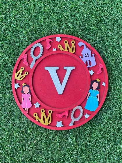 Another take on the princess-themed monogram, showcasing different color choices.