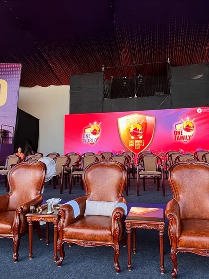 A view of the ornate, high-back chairs reserved for dignitaries at the cricket league event. We provide a range of furniture options, from standard seating to luxurious chairs, to suit every requirement.