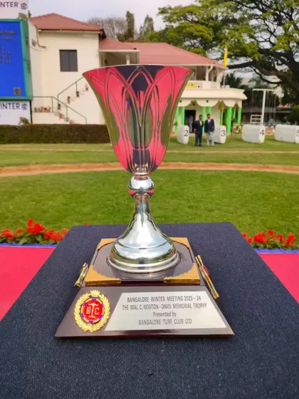 The Maj. C. Newton-Davis Memorial Trophy, a beautiful pink and silver glass cup.