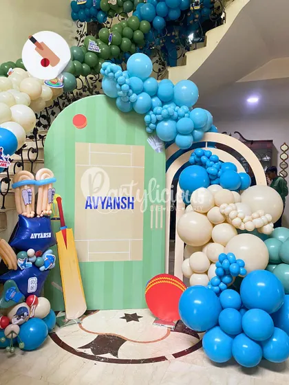 Howzat for a party? This cricket-themed birthday setup for Avyansh was a big hit, featuring a custom pitch backdrop, balloon stumps, and an arch in team colors.
