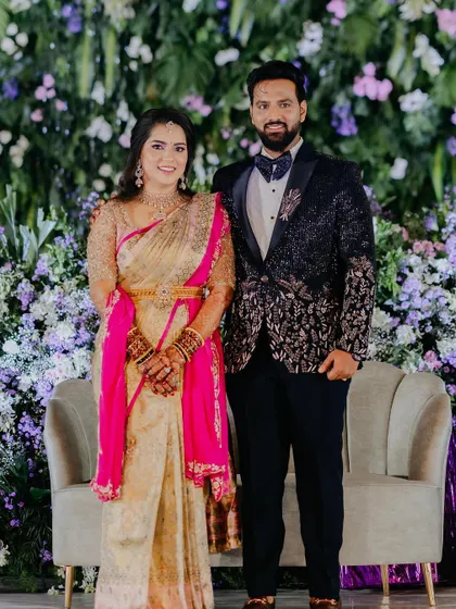 The full reception look, showcasing the beautiful saree and the complementary makeup that glows under the lights.