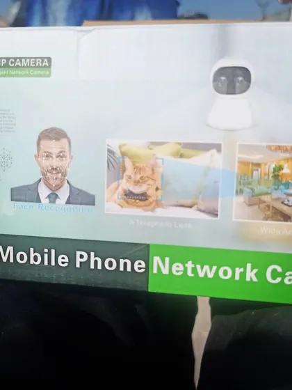 The packaging for the AI HD IP Camera, which highlights its intelligent features like face recognition and wide-angle lens capabilities.