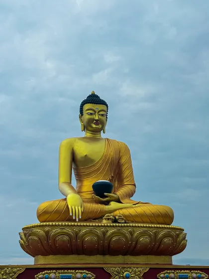 The giant Buddha statue in Mussoorie against a cloudy sky. The quality and color captured by my phone camera never cease to amaze me.