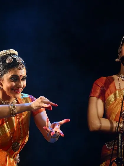 A moment from "Sarvasya" at the Samarpan festival in Mangalore, where I shared the stage with a mirrored version of myself, creating a unique visual effect.