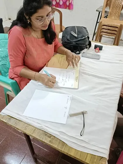 At my desk during the Janapriya apartments skin camp, ready to help the next patient.