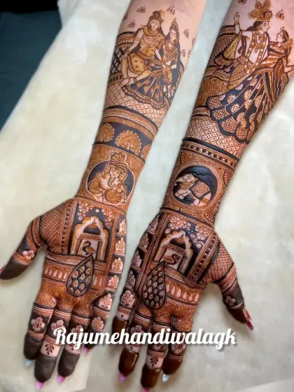 A stunning bridal design combining multiple divine figures. It has Radha-Krishna and Shiva-Parvati on the arms, with Ganesha and a horse motif on the hands.