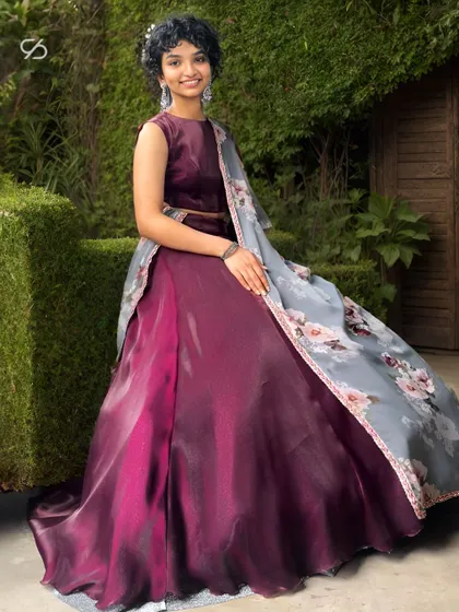 Elevate your bridesmaid squad with breathtaking elegance! Our stunning lehenga, adorned with shimmer and paired with a printed dupatta, is your go-to for standing out on any occasion.