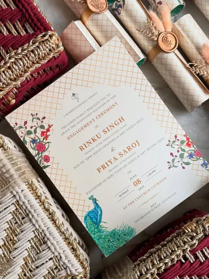 It was an honor to design the engagement invitation hampers for cricketer Rinku Singh and MP Priya Saroj. The design features a majestic peacock and floral motifs, reflecting a blend of royalty and tradition, paired with intricately woven gift boxes.