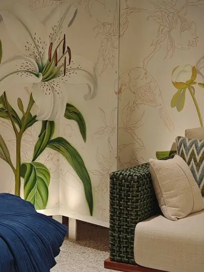 'A Walk in my Garden', a collaborative mural with Studio Nishita Kamdar. This piece combines painted flowers with delicate line drawings, capturing a feeling made tangible.
