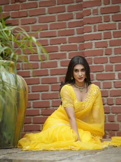 A final look at the yellow saree, a perfect blend of modern style and traditional elegance.