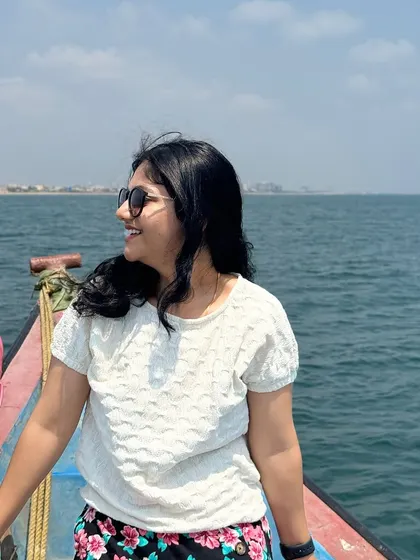 Soaking in the sun and the sea breeze. A client enjoying the beautiful scenery during one of our mid-sea surprise adventures.