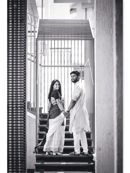 A stylish black and white anniversary shoot on a modern staircase. We love celebrating your milestones with you, creating timeless portraits long after the wedding day.