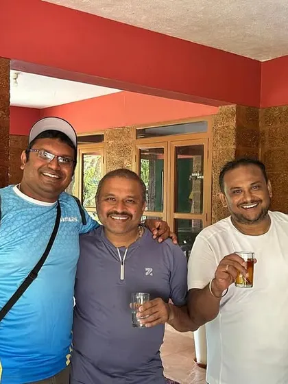 Sharing a cup of black tea with friends at a homestay. These are the relaxed moments of bonding and conversation.