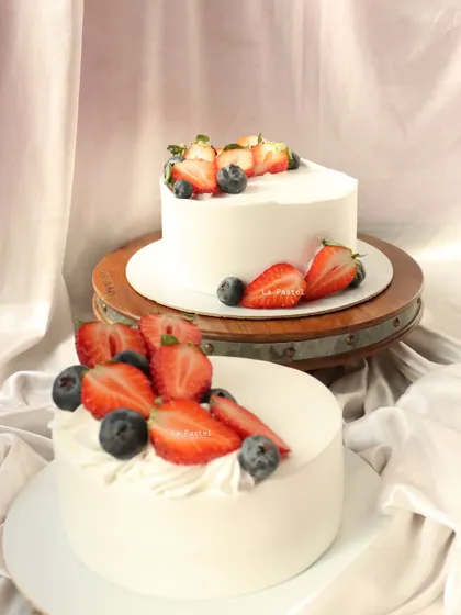 Two of my fresh berry cakes, ready for delivery. They are perfect for any occasion.