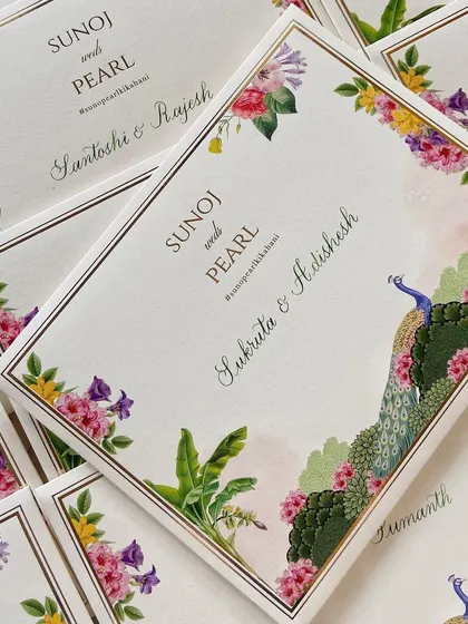 Envelope addressing has my heart. I addressed these gorgeous floral and peacock-themed invites with classic copperplate calligraphy, adding a personal touch to each one.