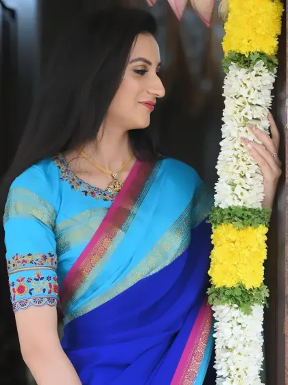A side profile of the party look, showing the soft, natural makeup and simple hairstyle.