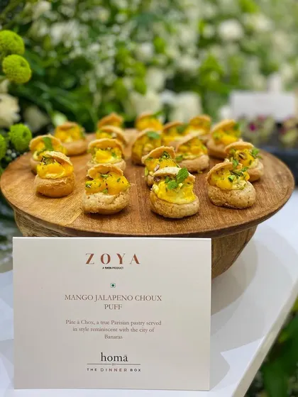 Another angle of our popular Mango Jalapeno Choux Puffs, highlighting their perfect bite-sized form and fresh garnish.