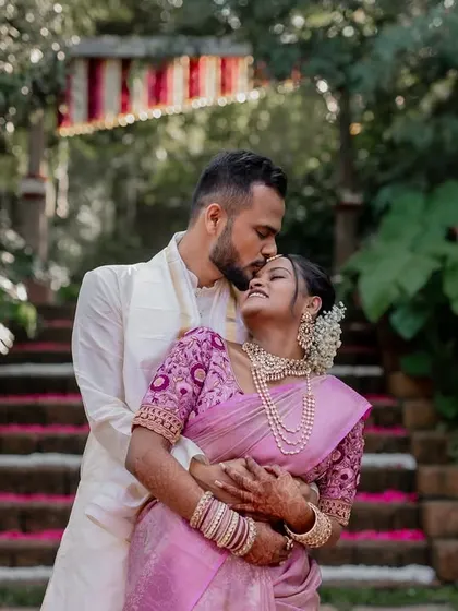 A playful and romantic moment on the steps of The Peacock Grove. We encourage our couples to be themselves, which allows us to capture their unique personalities and connection.