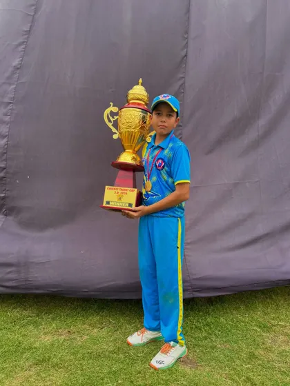 A little champ with a big trophy. The future is bright.