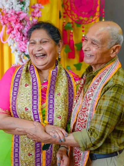 A candid moment of pure laughter between an older couple during a Mehendi ceremony. These are the moments I love to capture.
