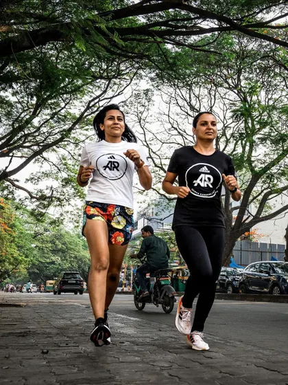 A duplicate of image 45. Running side-by-side with a teammate.