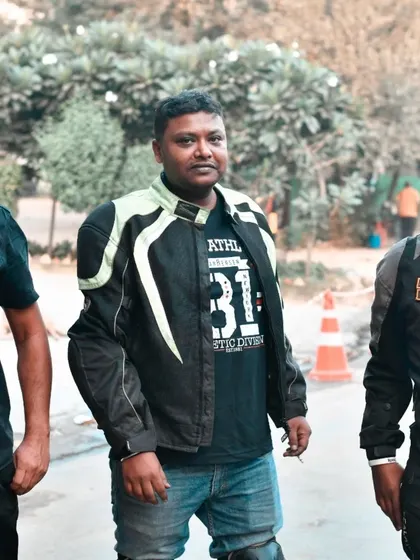 A group shot of three riders at a meetup. Their varied gear and stances show the diversity within the community, united by a shared passion for riding.