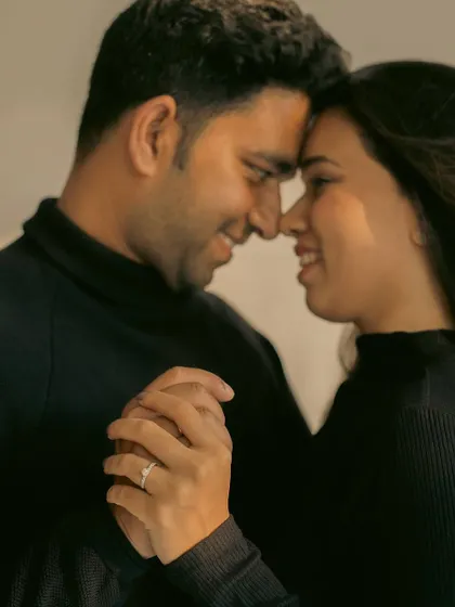 A close up shot focusing on the intimacy of holding hands and a gentle touch. We believe these small details tell a big part of your love story.