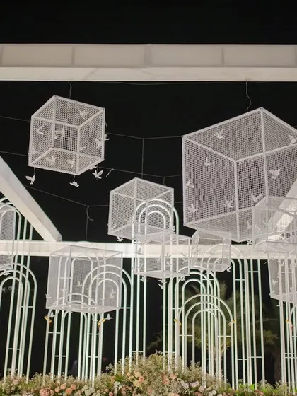 A unique overhead installation made from wire mesh cubes and birds, creating a sense of flight and freedom above the seating area. It’s all about creating unexpected moments of art.