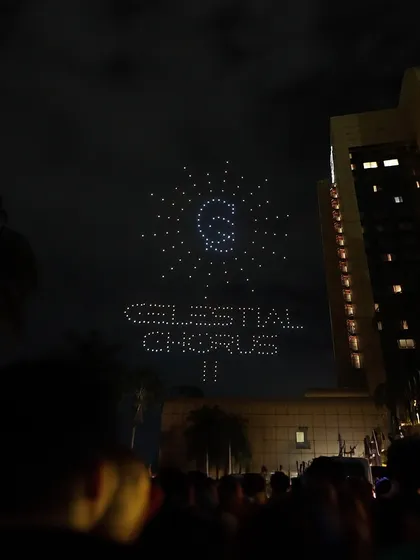 The "Celestial Chorus II" drone show lights up the sky in Zimbabwe. This image, taken from the crowd, shows how we can bring grand, thematic concepts to life across borders.