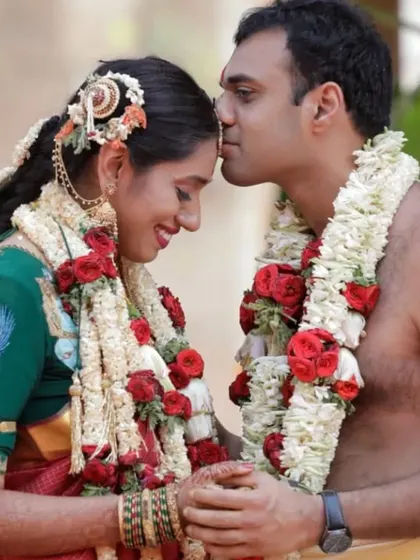 An intimate and tender moment between the couple during their wedding ceremony. These quiet, emotional exchanges are just as important as the grand rituals.