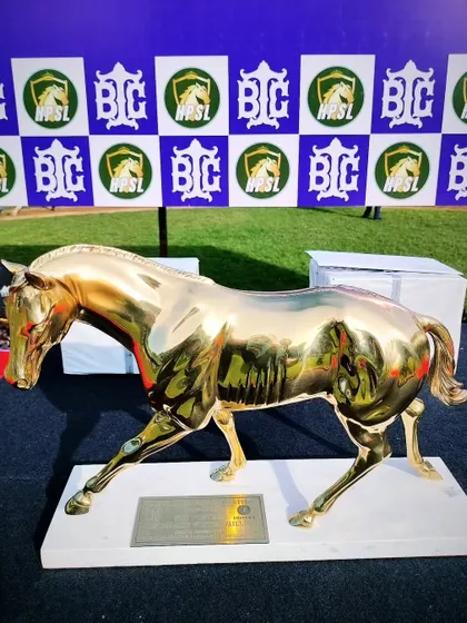 The Foster's Bangalore Winter Million trophy, a stunning golden horse sculpture.