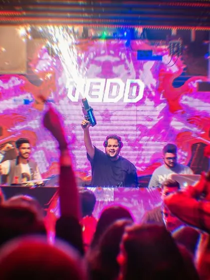 When I'm on the decks, I bring the full show. This is me with a CO2 cannon, creating pure mayhem and ensuring the energy on the dance floor is explosive.