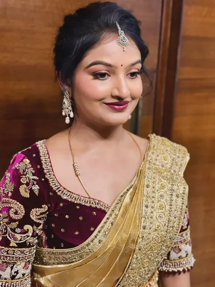 A side view of Dr. Nayana's look, showing the subtle contour and highlight that gives her face a beautiful dimension.