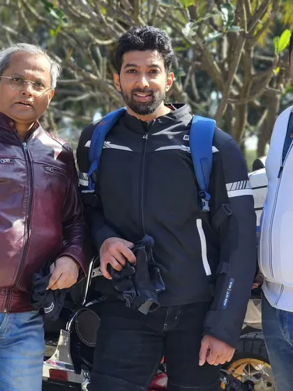 A casual moment with friends and fellow riders after a weekend breakfast ride.