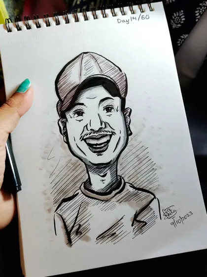 This caricature of a smiling man in a cap was a special request. It's an honor to draw people's loved ones.