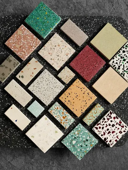 A large black terrazzo slab serves as the backdrop for a curated selection of our most popular and unique tile designs.