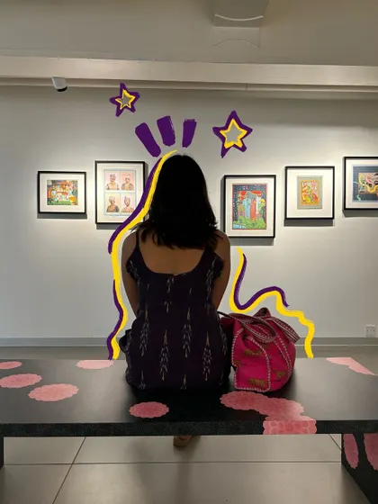 Admiring some art, with doodles that add my own artistic touch to the scene.