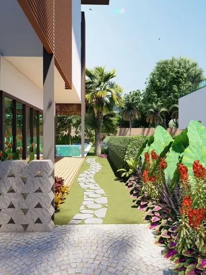 A 3D visualization of a villa garden, showing a winding stone path through a lawn bordered by vibrant red and purple flowers. This concept helps clients envision the color and texture of the final planting scheme.