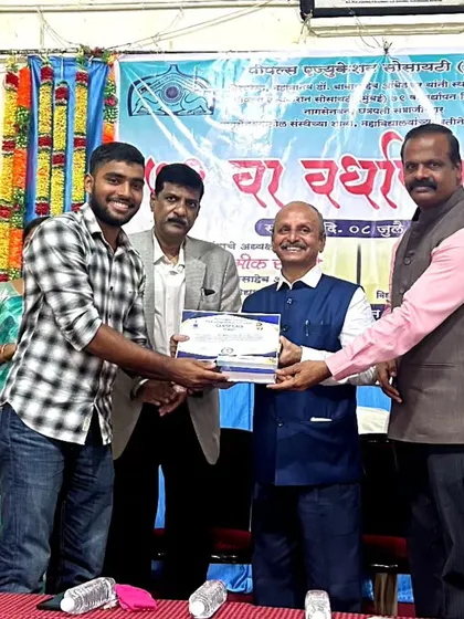 Coach Rohit receiving his certificate, officially becoming a certified physical education teacher.