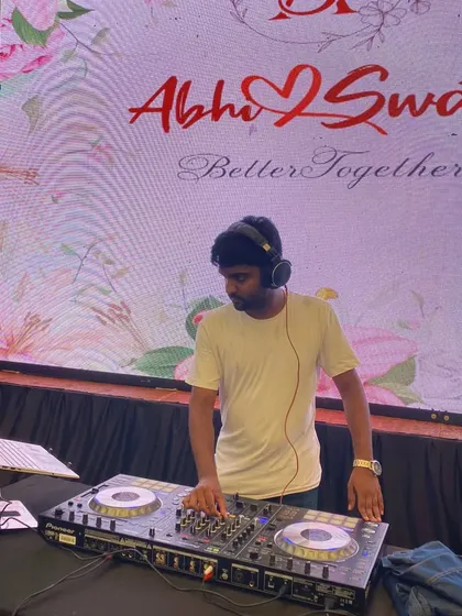 A personalized LED screen with the couple's name adds a classy touch to the DJ setup. This was for Abhi and Swathi's beautiful wedding reception.