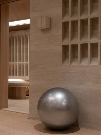 Further images from the BeWell, QBF Coffee, and Tubu projects, illustrating the consistent use of natural materials, clean lines, and thoughtful lighting to create serene and restorative commercial spaces.