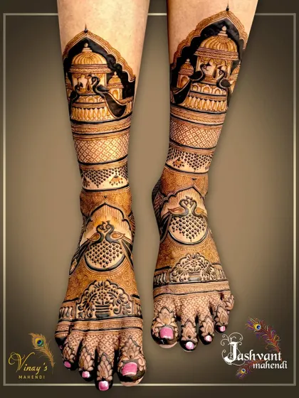 Another angle of the full-leg palace and peacock design, highlighting the symmetry and flow of the patterns from the toes to the shins.