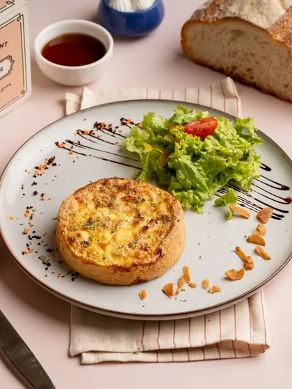 Another look at my popular Chicken & Mushroom Quiche, plated beautifully with a side salad. The golden-brown crust promises a delicious, buttery bite.