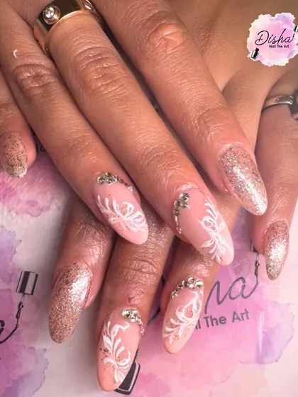 A chic and classy design with glitter, white patterns, and delicate rhinestone accents.