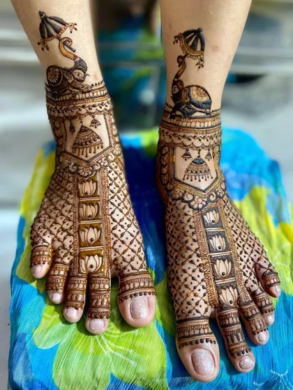Another perspective of the unique elephant and peacock foot design, highlighting the creativity and storytelling in the artwork.