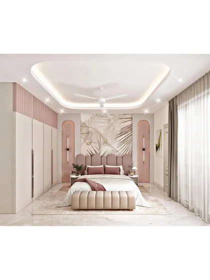 A soft and feminine bedroom design with a palette of blush pink and cream. The custom headboard, elegant wall paneling, and statement wallpaper create a chic and dreamy personal space.
