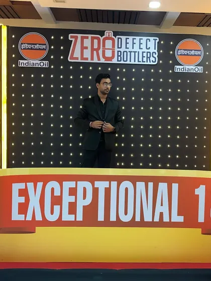 On the grand stage for an IndianOil "Zero Defect Bottlers" event. The stage design adds to the impact of the performance.