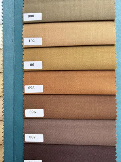 Our extensive range of brown and camel fabrics, perfect for crafting elegant and timeless menswear.