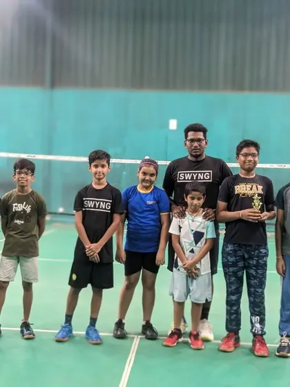 Another happy group from our badminton coaching program, building skills and friendships on the court.