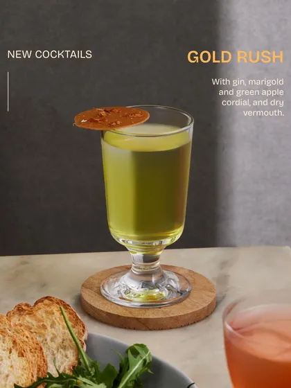 The Gold Rush, a signature gin cocktail from our new menu. It features a house-made cordial of marigold and green apple, balanced with the botanicals of gin and dry vermouth.